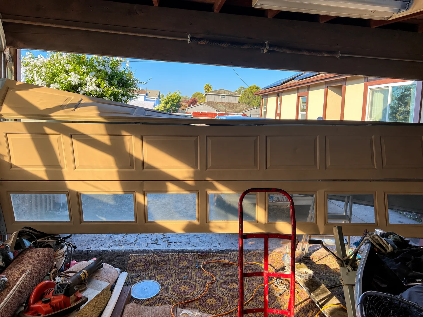 Garage Door Panel Repair vs. Replacement: How to Know Which You Need